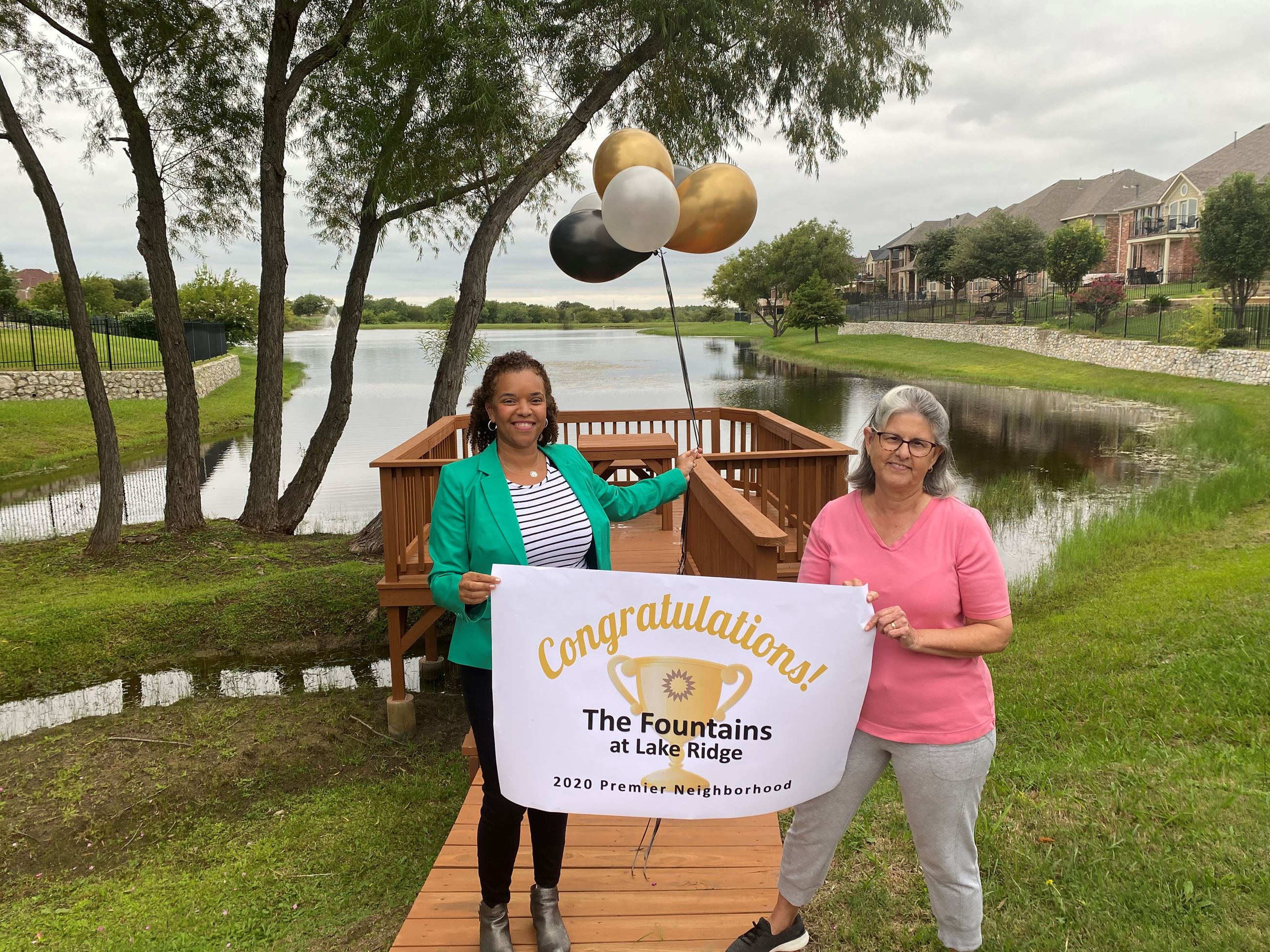 Residents of Fountains of Lake Ridge accepting their award